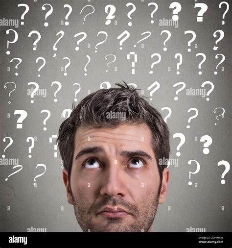 Confused Curious Man Thinking Looking Up Has Many Questions And No Answer Isolated On Gray
