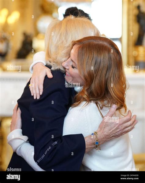 The Queen Consort With Geri Horner During A Reception For Winners Of