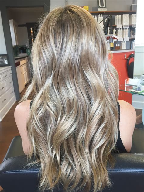Balayage/Hair painted her to create a beautiful cool blonde and styled