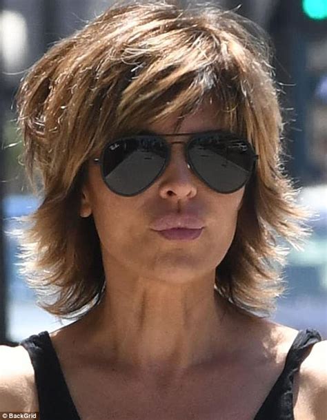 Lisa Rinna Wears Vest And Ripped Jeans In Beverly Hills Daily Mail Online