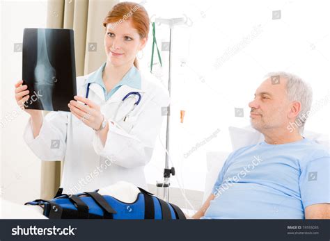 Hospital Female Doctor Examine Xray Senior Stock Photo Edit Now 74555035
