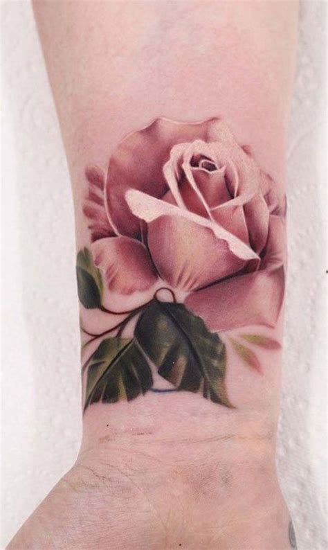 Pink Rose Dainty Hand Tattoo Your A Z Guide To Flower Tattoo Meanings