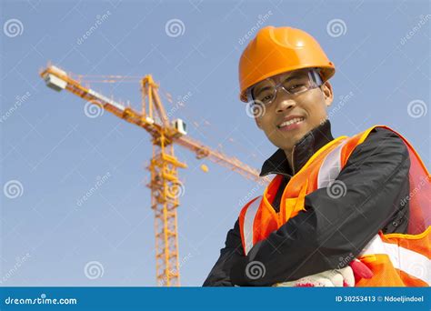 Construction Worker With Crane In Background Stock Image Image Of