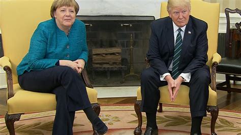 Angela merkel has been accused of having blood on her hands for her open door migrant policy following a fourth terror attack in germany in a week. Donald Trump, Angela Merkel avoid handshake during photo ...
