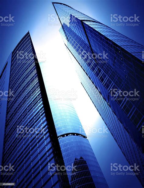Modern Glass Silhouettes Of Skyscrapers At Night Stock Photo Download