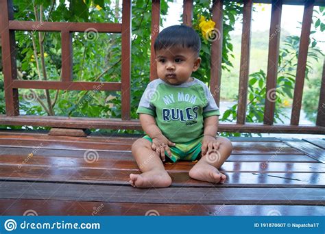 Little Asian Baby Boy Sitting At Park Stock Image Image Of Green