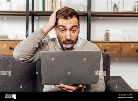 Shocked Man Looking Down Hi Res Stock Photography And Images Alamy