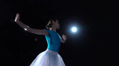 Gracefully Thin Ballerina In White Tutu Dancing Classical Ballet
