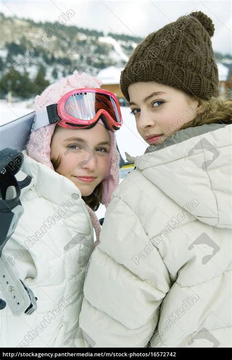 two teenage girls looking over shoulders at camera stock image 16572742 panthermedia stock