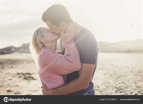 Couple Kissing Beach Ocean Stock Photo By Simonapilolla 232158614
