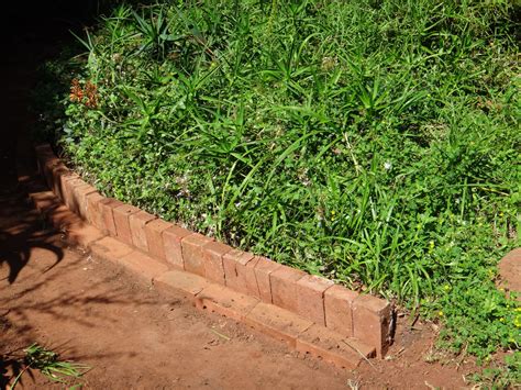 Similar to the curb design in the former example, this edging uses traditional bricks molded together to create a wide and high edge for your garden or sidewalk. 23 Stunning Brick Landscape Edging - Home, Family, Style ...