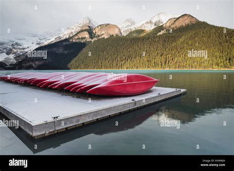 Red Kayaks On A Dock In Lake Louise Banff National Park Alberta