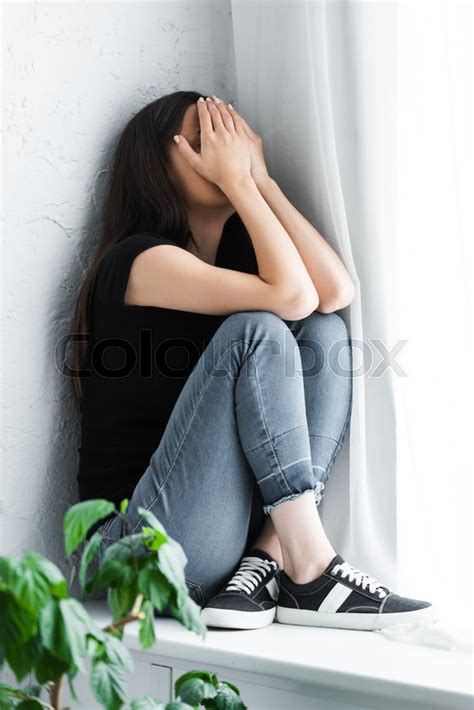 Depressed Young Woman Crying While Stock Image Colourbox
