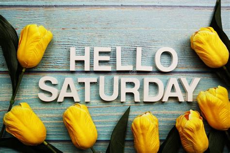 Hello Saturday Text On Black Letter Board And Bouquet Colorful Flowers
