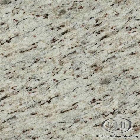 We have decided on moon white granite for kitchen countertops with white cabinets and chestnut handscraped hardwood floors. White Moon Granite - Kitchen Countertop Ideas