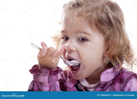 Little Girl Eating Yogurt Stock Image Image Of Little 18962633