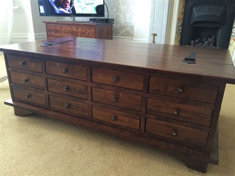 The storage area is big and i really like that part of the top lifts up. Laura Ashley Garrat Chestnut 12 Drawer Coffee Table | in ...