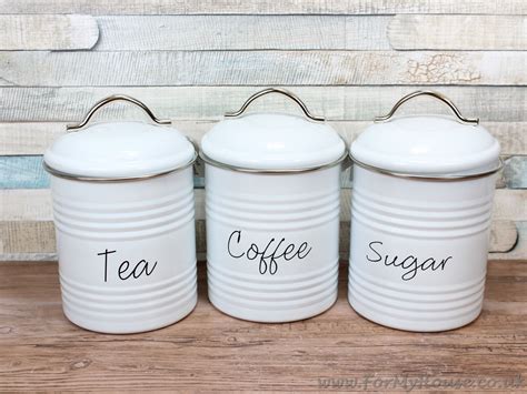 Use these tea coffee sugar canisters in your kitchen for your convenience. White metal Tea coffee & sugar canisters storage kitchen ...
