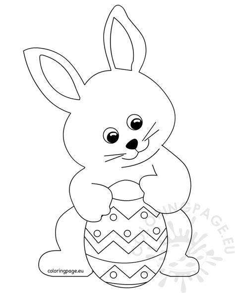 Cute Bunny Holding Easter Egg Coloring Page
