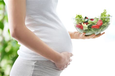 Pregnant Woman Eating Healthy Food