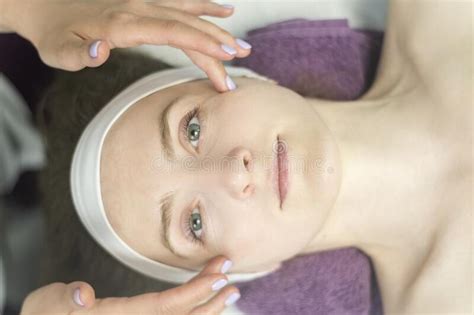 Face Of Young Woman During Procedure Of Applying Cream Healthy Facial Massage Lymphatic