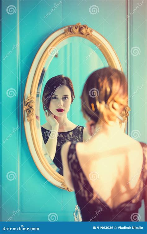 Young Woman Looking At Mirror Stock Photo Image Of Makeup Model