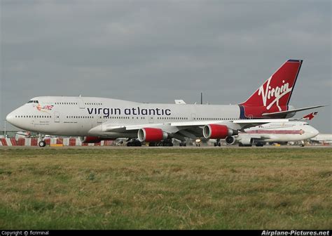 It has a limited upper class cabin with only 14 seats, but it is one of the most exclusive cabins as it. Virgin Atlantic Boeing 747-400 London Heathrow