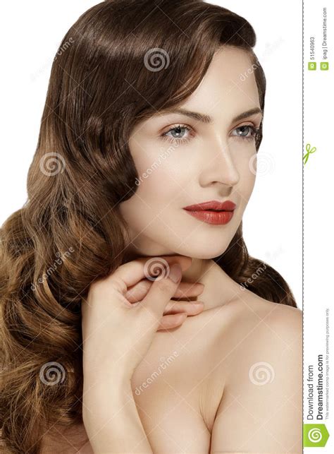 Beautiful Model Showing Healthy Brown Wavy Hair Stock