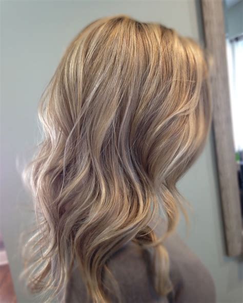 Who says blonde highlights for dark brown hair have to be subtle? Dark and light blonde highlights … | Sandy blonde hair ...