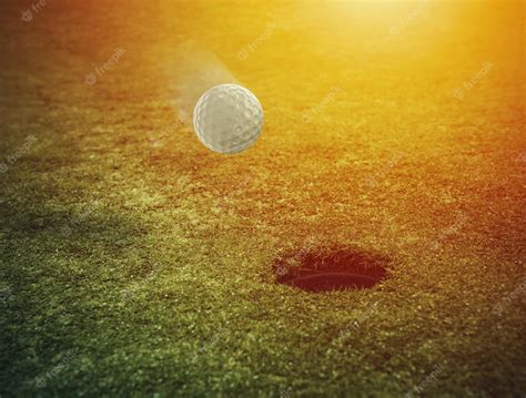 Premium Photo Golf Ball Near The Hole In A Grass Field