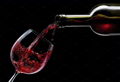 Red Wine Is Poured Into A Wine Glass Featuring Alcohol Bar And