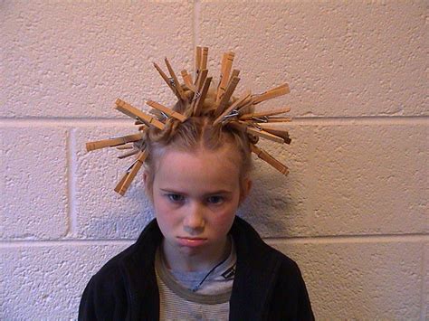 Have your child pick out their feathers for each of the silly hair stick puppets they will be making. Sarah's "crazy hair day" | axel cleeremans | Flickr