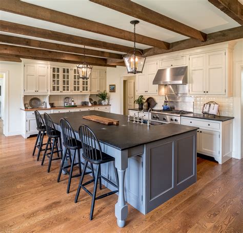 Open Farmhouse Kitchen With Wood Beams Display Cabinetry Farmhouse