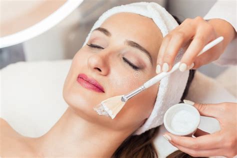 Close Up Of A Beautiful Woman Relaxing During Facial Treatment I Stock Image Image Of