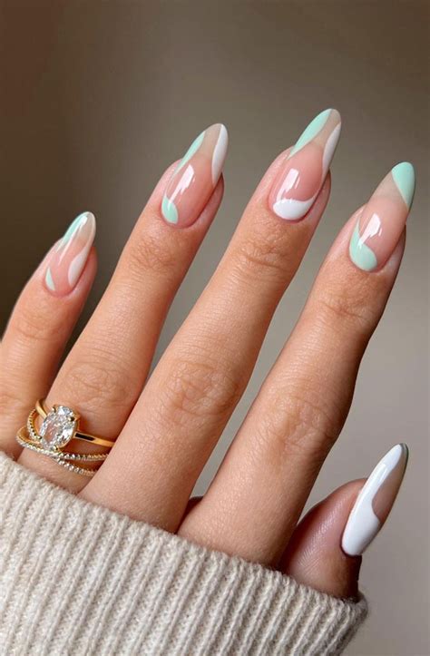 Almond Nails For A Cute Spring Update Mint Negative Space Nails