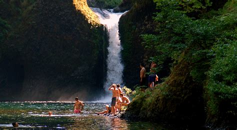 Swim In The Basin Of The Beautiful Punchbowl Falls In Oregon