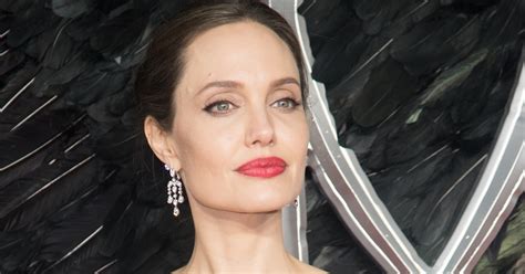 Angelina Jolies Height And Fashion Sense How She Makes The Most Of