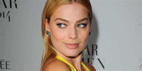 Margot Robbie Shines In Canary Yellow Dress At Harpers Bazaar Women Of