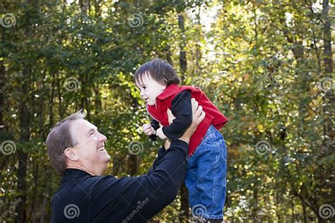 Grandfather And Granddaughter Playing Stock Image Image Of