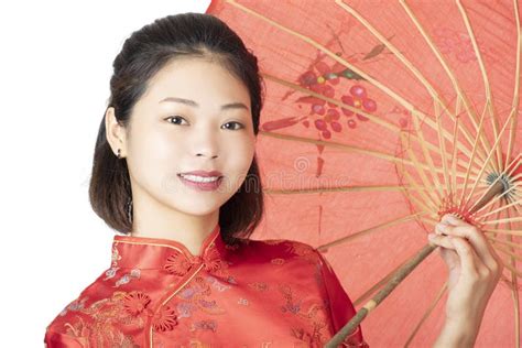 Beautiful Chinese Woman Wearing A Chipao Isolated On White Background