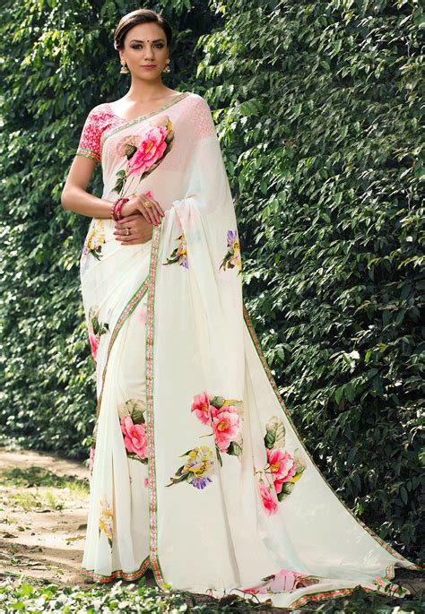 Faux Georgette Saree In Cream This Eye Captivating Drape Is Beautifully