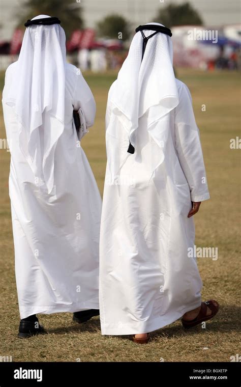 Two Arabs In Traditional Clothing Dubai United Arab Emirates Stock