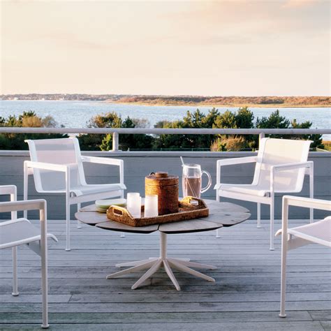 Eero saarinen's pedestal collection includes dining, coffee and side tables. Petal Coffee Table by Knoll - The Century House - Madison, WI