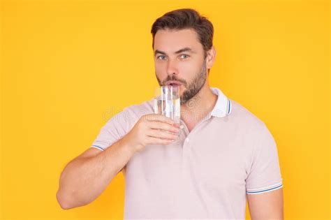 Man Drinking A Fresh Glass Of Water Thirsty Man Holding Glass Drinks