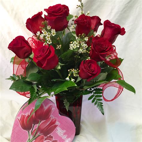 Dozen Red Roses With Waxflower In A Red Square Vase Rose Dozen Red