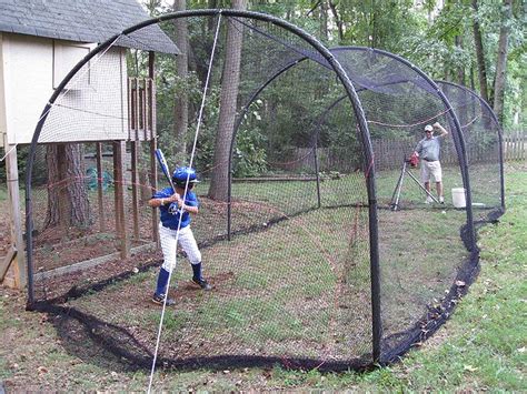 This package comes with a #32 hdpe knotless net made to fit the trapezoid frame. Backyard Batting Cage with Pitching Machine I'm quite sure ...