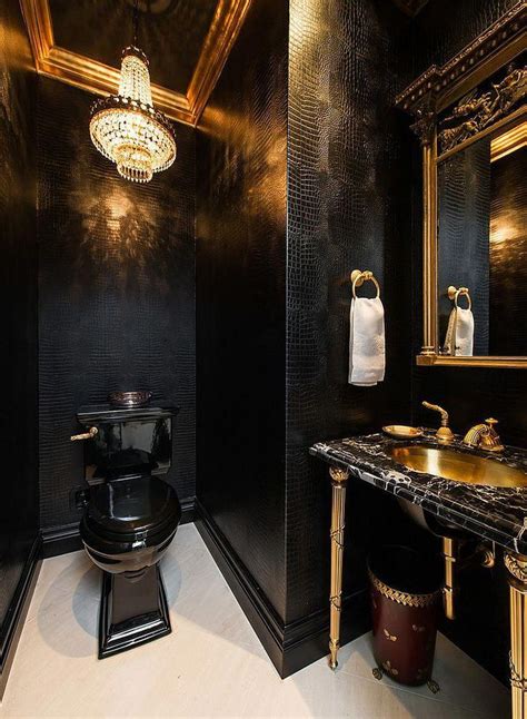 The stock continued to tumble and eventually fell 40 per cent below its peak levels. Traditional powder room in gold and black! So chic with ...