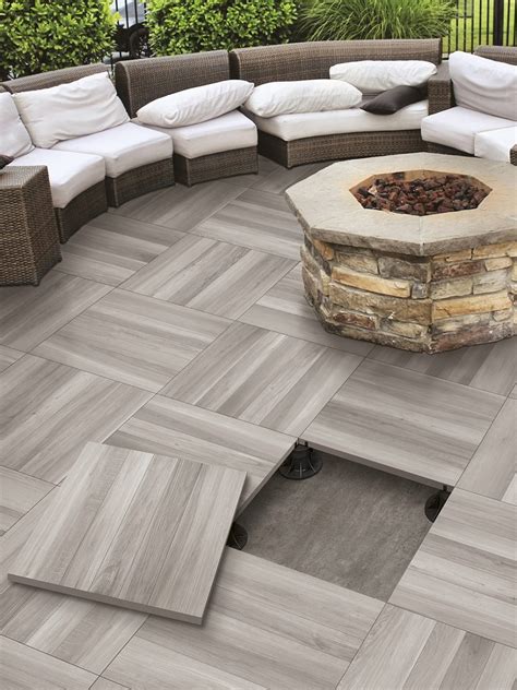 Floor covering options for concrete pad and pavers. Top 15 Outdoor Tile Ideas & Trends for 2016 - 2017