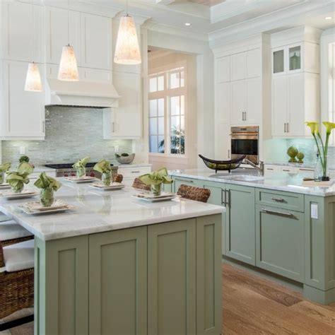 Gray wash stained wood & i don't care how many gold lights illuminate a black shaker kitchen peninsula accented with brass hardware and a white quartz. For the Home by Gina McKerrow | New kitchen cabinets ...