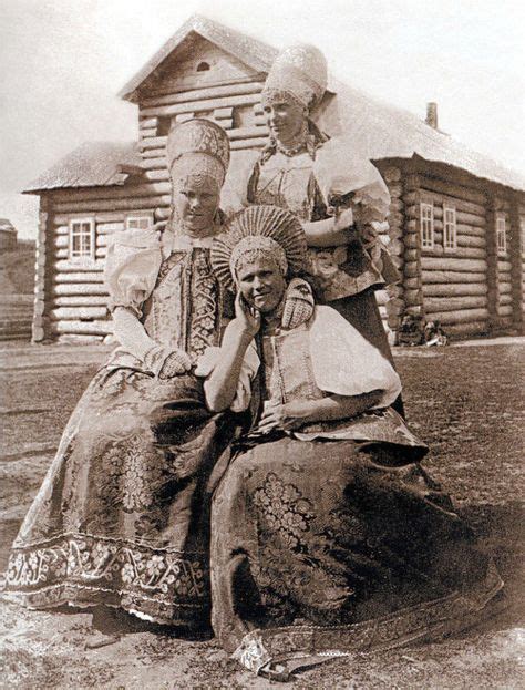 festive attires of russian peasants woman in a kokoshnik headdress right and two girls in